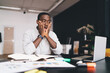 © BullRun - Worried black man surprising looking at laptop screen