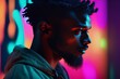 young man with afro hairstyle in studio young man with afro hairstyle in studio portrait of handsome african american man with dreadlocks in neon lights. man in fashionable stylish clothes.