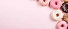 Donut Arrangement On A Flat Surface With An Empty Space For Writing