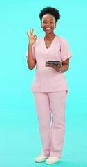 Poster - Smile, tablet and perfect with a nurse black woman on blue background in studio for healthcare. Portrait, medical and research with a happy young female medicine professional in scrubs for feedback