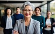 Head shot portrait smiling multiethnic employees group with mature businesswoman executive team leader looking at camera, happy diverse colleagues posing for photo in office, unity and cooperation