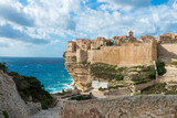 Fototapeta  - The city of Bonifacio at the edge of the cliff, Corsica France.