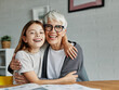 © Lumos sp - grandchild granddaughter grandma grandmother portrait  girl senior love family bonding daughter hugging hug