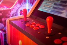 Close-up Of Retro Arcade Joystick And Buttons, Vibrant Colors And Details Of A Classic Gaming Machine, Entertainment And Gaming Concept
