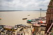 View of the river Ganges with its boats, people and sacred water of Varanasi in India