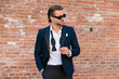© Viorel Sima - attractive elegant businessman with sunglasses looking to side
