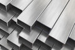 Aluminium or steel profiles for windows manufacturing. Stack of aluminium or steel profiles in warehouse.