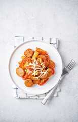 Wall Mural - Meat sausage tomato sauce pasta in a bowl