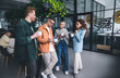© BullRun - Diverse colleagues having drinks during break