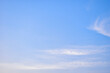 © sutichak - beautiful blue sky and white fluffy cloud with sunrise in the morning, natural background