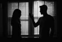 Silhouette Of A Married Couple Having An Argument