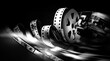 Creative Retro Mono Chromatic Movie Film Background with film strips spools and reels