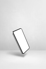 Sticker - Floating smartphone isolated on white. Vertical background