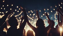Silhouettes Of People Dancing At A Crowded Party At Midnight, Colorful Lights And Smoke At Background
