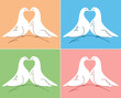A pair of white doves kissing forming a heart