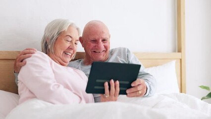 Wall Mural - Senior, happy couple and tablet for fun in bedroom with social media, post or meme on app. Elderly woman, man and married with laugh for joke by scroll, browse or reading on internet with connection