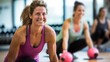 © radekcho - Beautiful women working out in gym. Close up image of group of healthy fit women at the gym exercising.
