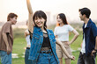 © Q88 - Image of a group of young Asian people laughing happily together