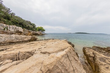 Wall Mural - Picture of a deserted section of the Istrian Adriatic coast in summer