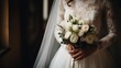 Beautiful bride with wedding flowers bouquet, attractive woman in a wedding dress.