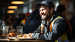 © Chanya2498 - Happy construction worker dining in site cafeteria