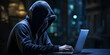 Dangerous Hooded Hacker Breaks into Government Data Servers and Infects Their System with a Virus. hacking computer system. male in mask and pullover. unrecognizable incognito male sit in hood