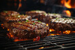 Delicious beef steak on the grill with flames