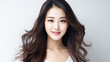 © BlazingDesigns - Portrait of beautiful asian Woman with her smooth skin. White background with copy space. Beauty skincare.