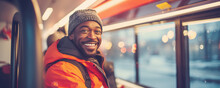 Happy african american man travelling on bus