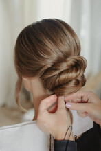 Bridal Bun Hairstyle Of Brunette Bride At The Getting Ready	