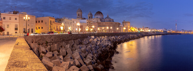 Wall Mural - The building of the Cathedral of the Holy Cross in Cadiz at sunset. Spain. Andalusia.