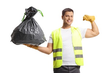 Wall Mural - Waste collector in a uniform and gloves holding a bin bag and showing muscles