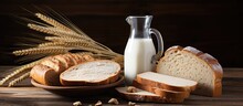 A Wooden Table Holds A Pitcher Of Milk And A Loaf Of Bread For Breakfast