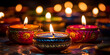Colorful traditional oil lamps diya lit during diwali celebration  Traditional Diya Lamps Aglow During Diwali 