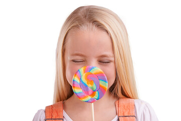 Isolated girl child, lollipop and eyes closed for memory, sweets or cover lips by transparent png background. Kid, candy or dessert with rainbow color snack for smile, fashion and thinking with ideas