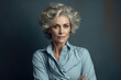 © vefimov - Woman wearing blue shirt striking pose for photo. This versatile image can be used for various purposes.