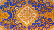 Ornament pattern at the wall of Tilya Kori Madrasa. Gold and blue. Traditional Uzbek decorative art. Samarkand, Uzbekistan
