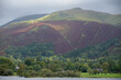 The Fairfield range towers above the lake at Grasmere in the Lake District