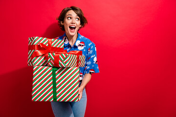 Poster - Portrait of pretty astonished girl open mouth hold pile stack giftbox look empty space isolated on red color background