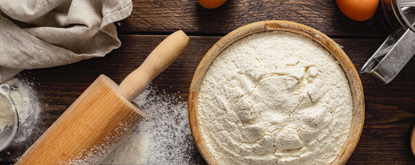 Poster - Flour in wooden bowl ingredients for baking