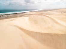 Aerial View Of A Desert Landscape With Sand Dunes And The Ocean In The Background, Port Lincoln National Park , South Australia.
