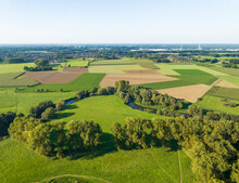 Aerial View Of Meandering River Roer With Meadows, Cropland And Trees, Roerdal, Melick, Limburg, Netherlands.