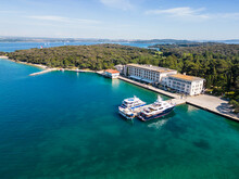 Aerial View Of A Small Yacht In A Small Harbour On Veliki Brijun Island, Brijuni National Park, Istria, Croatia.