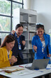© crizzystudio - Business team congratulates success, businesswoman presents marketing plan Receive praise from colleagues on the team Clap your hands in congratulations in the meeting room. Success concept.
