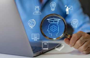 Wall Mural - human holding magnifier with graduation hat learning and study online class webinar technology, e-le