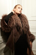 © Andrey Kiselev - lady in fur coat
