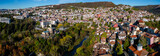 Fototapeta Tęcza - Aerial view on a sunny day at a small town 