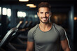 portrait of young muscular man resting in gym while looking at camera. Healthy lifestyle