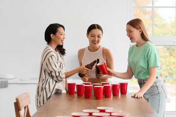 Poster - Female friends drinking beer at party