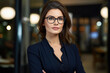 © Ruslan Gilmanshin - Happy young businesswoman smiling. Cheerful young businesswoman.